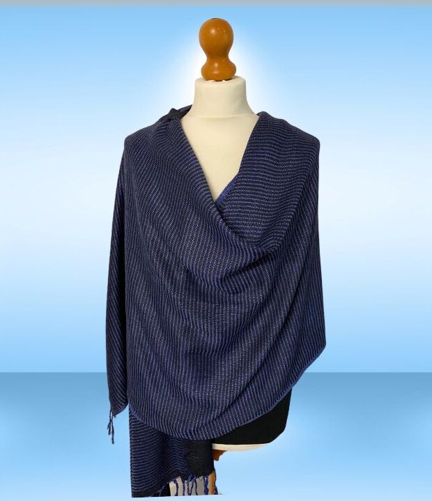 Our handwoven Winter Shawl And Chunky Scarf Is Super Soft. This Ethically Made Navy Winter Scarf Was Woven On Traditional Looms In Egypt. Slow Fashion At It’s Best!